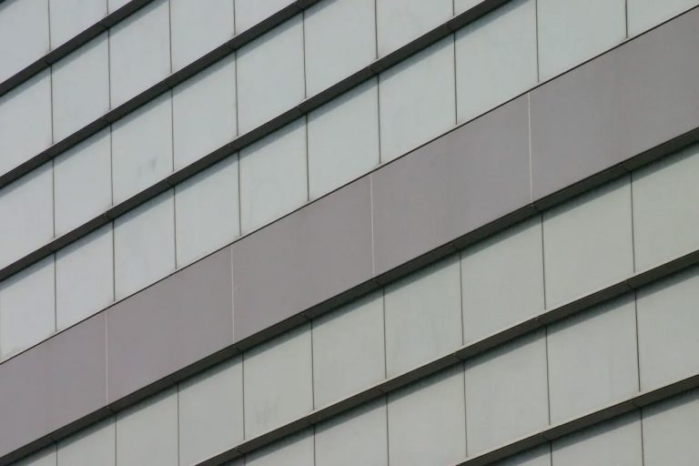Close-up of horizontal siding panels on an exterior wall